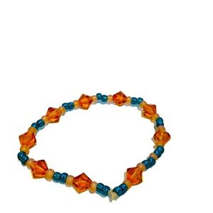 Stretchy beaded bracelet. Orange, turquoise and pink beads